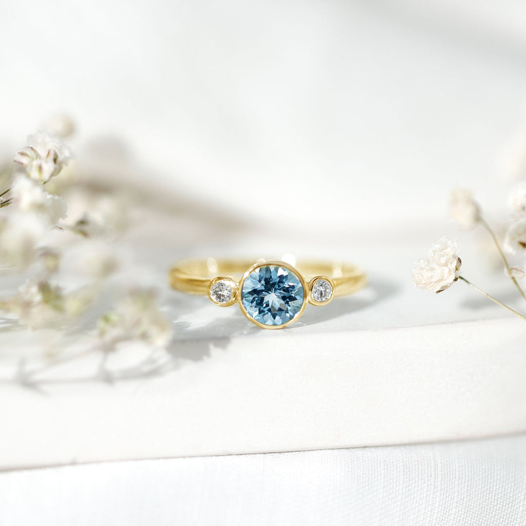 Bezel Set Aquamarine Solitaire Engagement Ring with Diamond