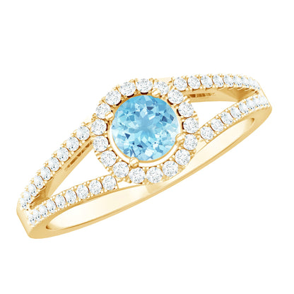 1 CT Aquamarine and Diamond Split Shank Engagement Ring