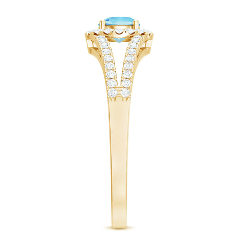 1 CT Aquamarine and Diamond Split Shank Engagement Ring