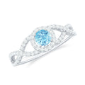 Aquamarine Criss Cross Engagement Ring with Diamond Halo