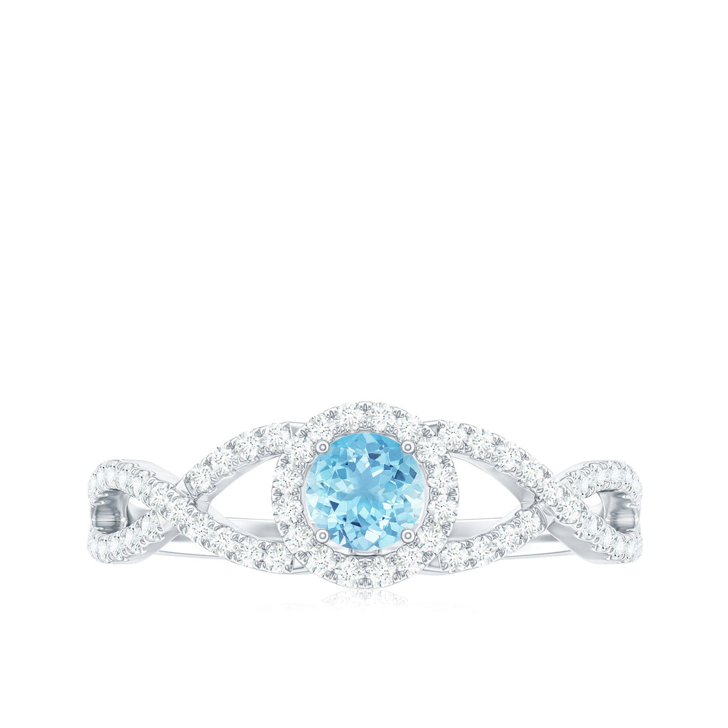 Aquamarine Criss Cross Engagement Ring with Diamond Halo