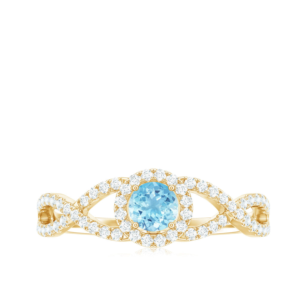 Aquamarine Criss Cross Engagement Ring with Diamond Halo