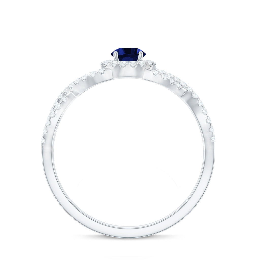 Certified 0.6 Carat Lab Grown Blue Sapphire Crossover Engagement Ring with Moissanite