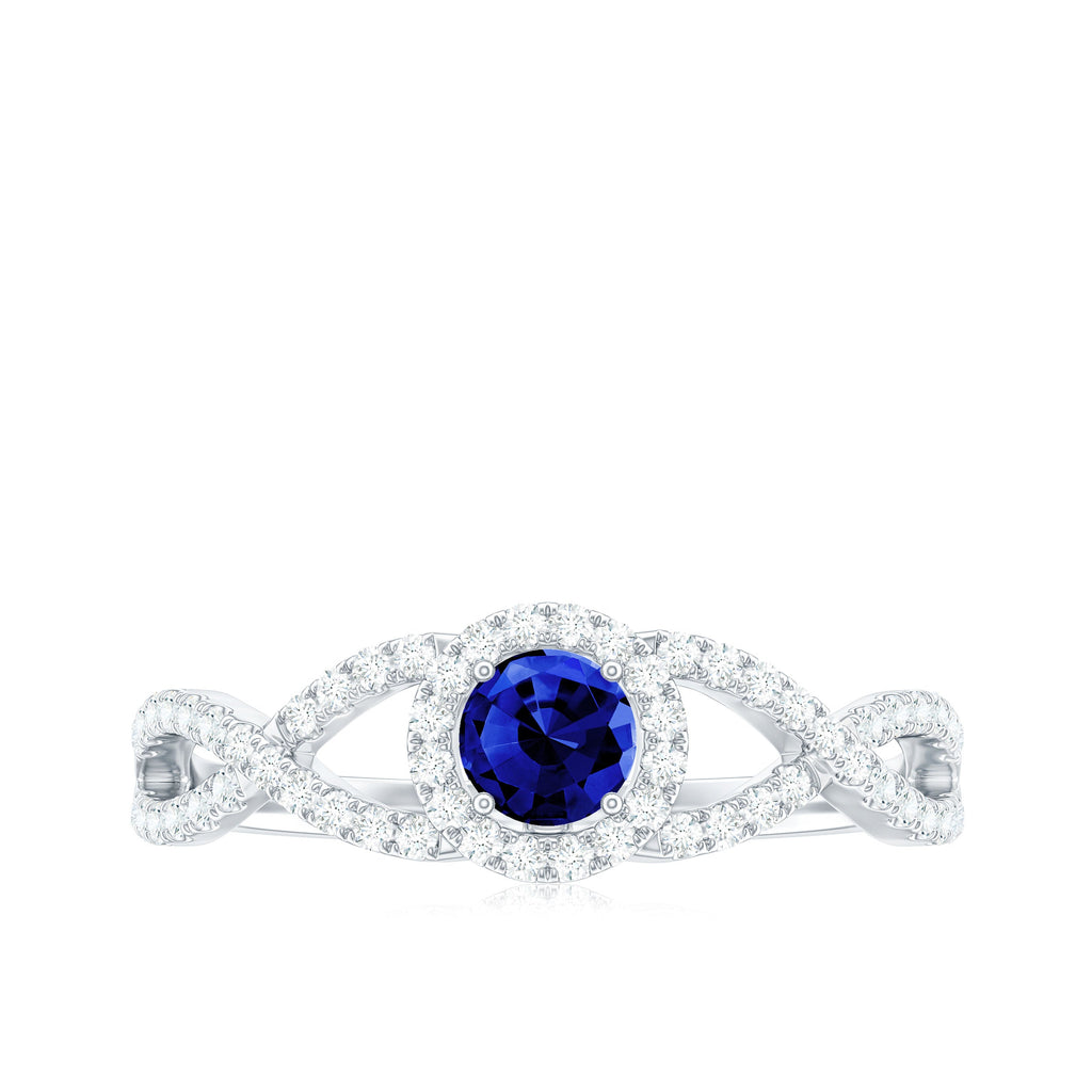 Certified 0.6 Carat Lab Grown Blue Sapphire Crossover Engagement Ring with Moissanite