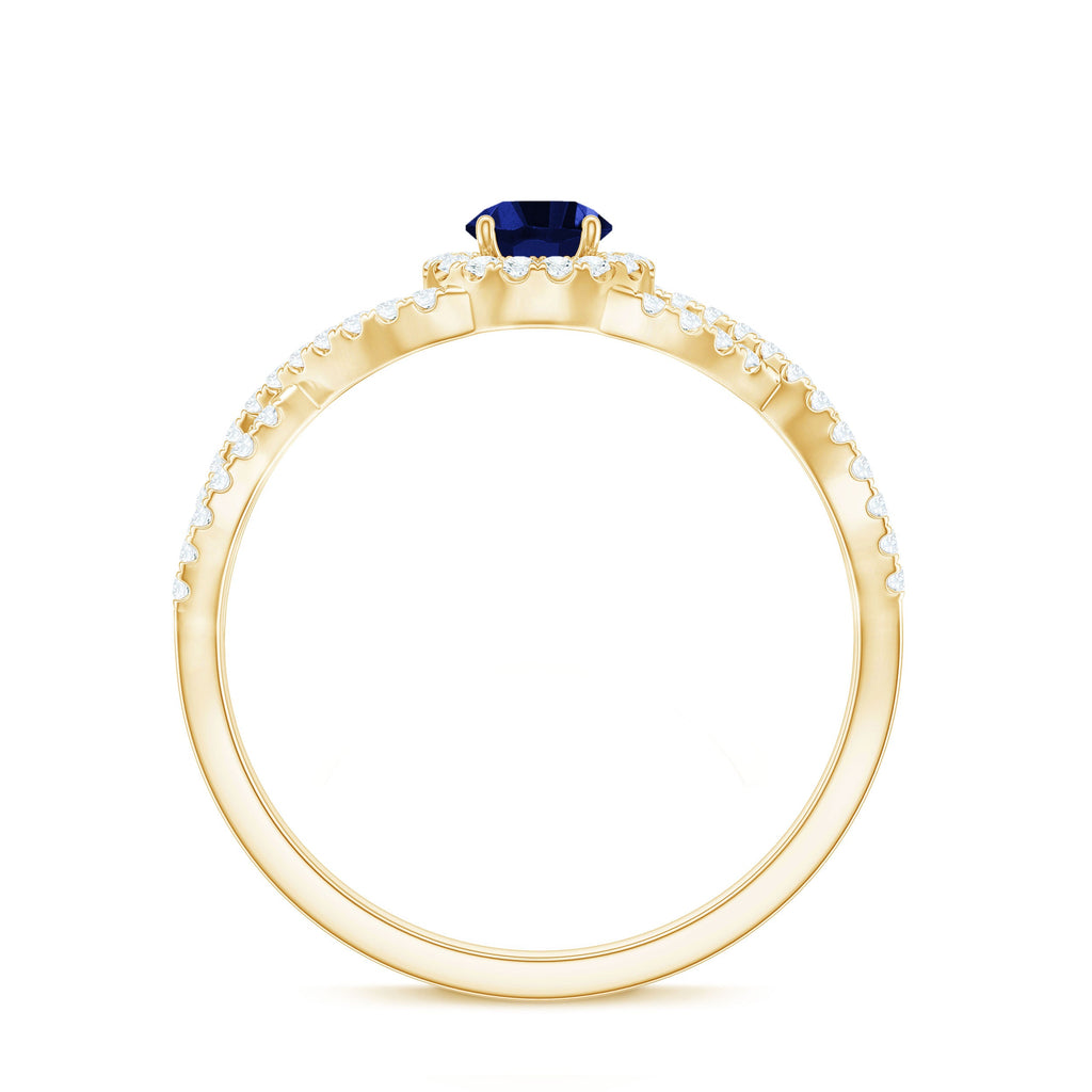 Certified 0.6 Carat Lab Grown Blue Sapphire Crossover Engagement Ring with Moissanite