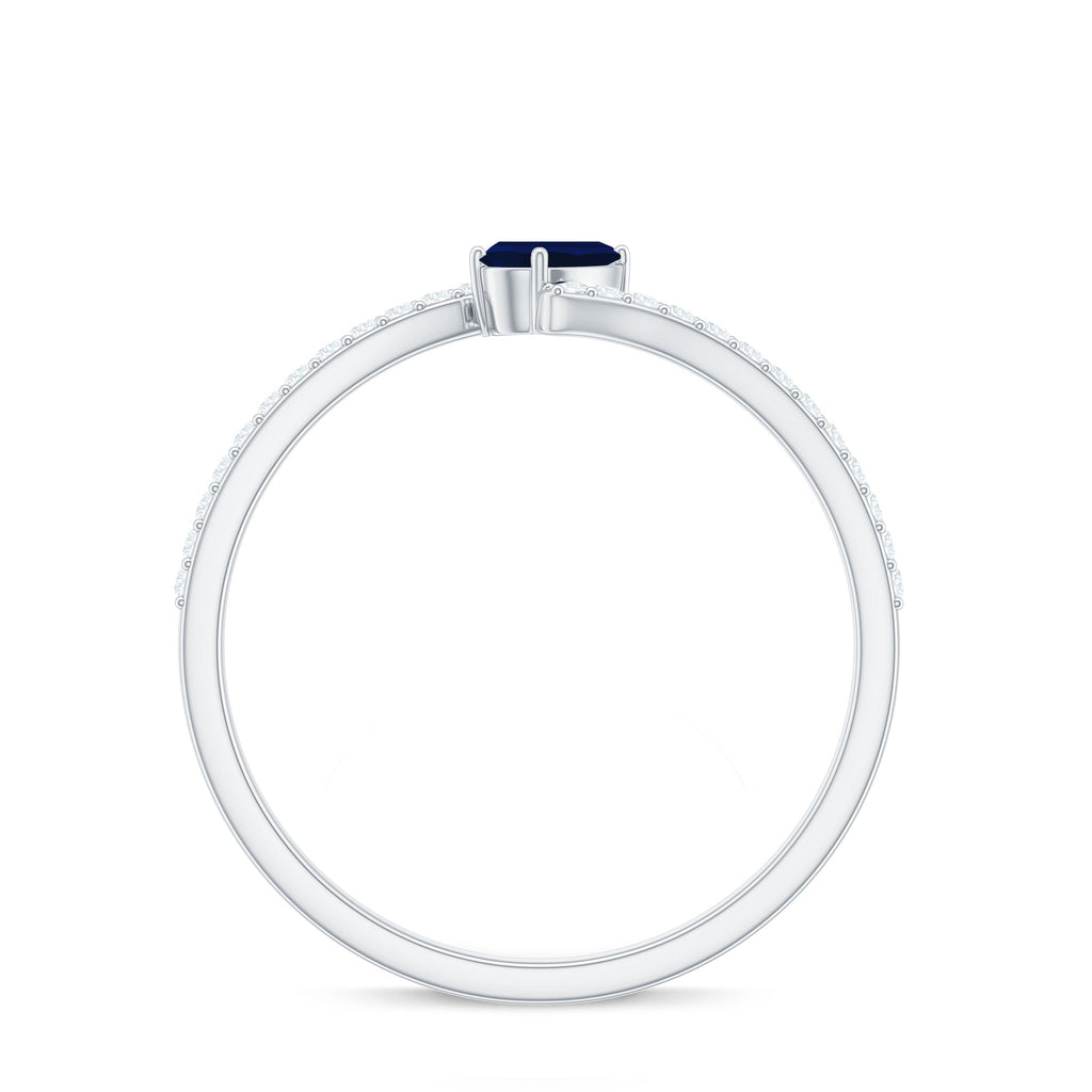 Tilted Pear Cut Blue Sapphire Solitaire Bypass Ring with Diamond