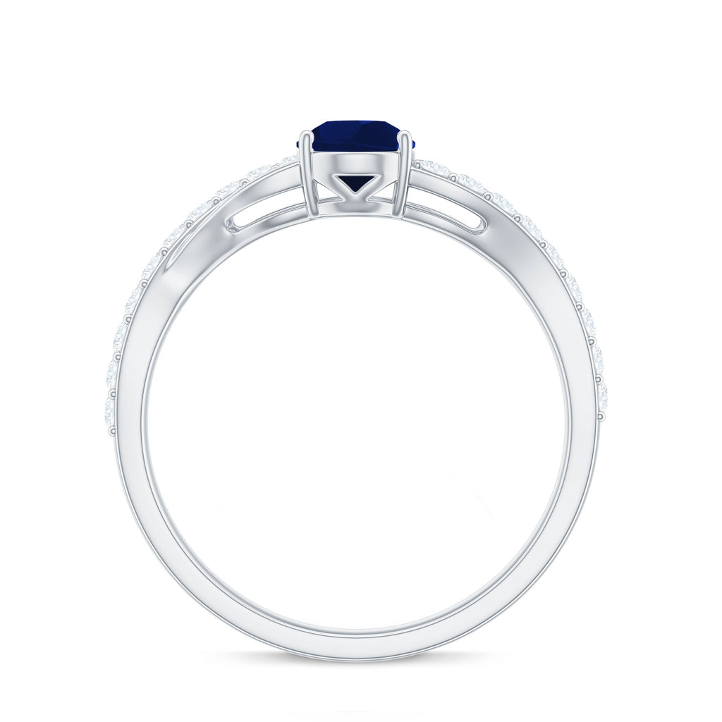 Pear Cut Blue Sapphire Solitaire Split Shank Ring with Diamond
