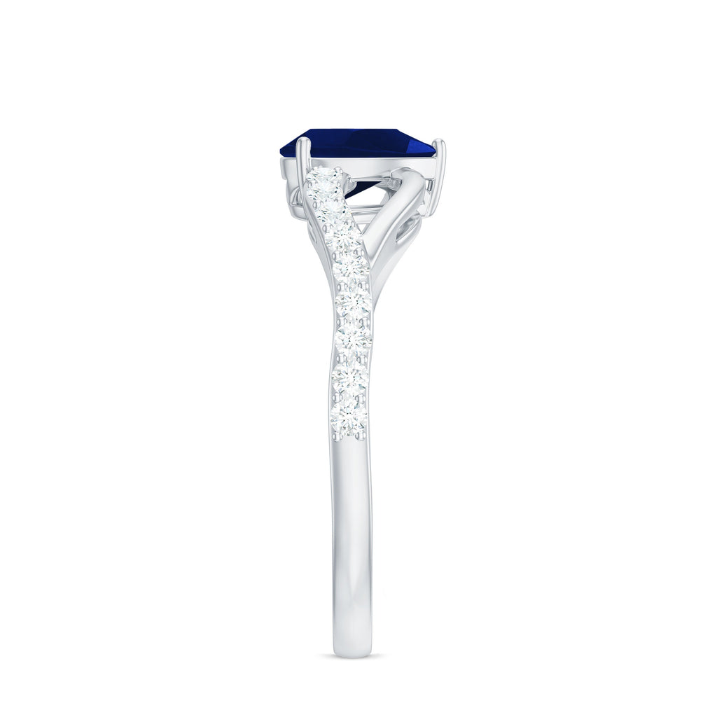 Pear Cut Blue Sapphire Solitaire Split Shank Ring with Diamond