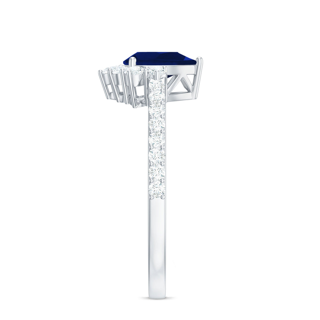 Blue Sapphire Teardrop Solitaire Ring with Diamond Accent