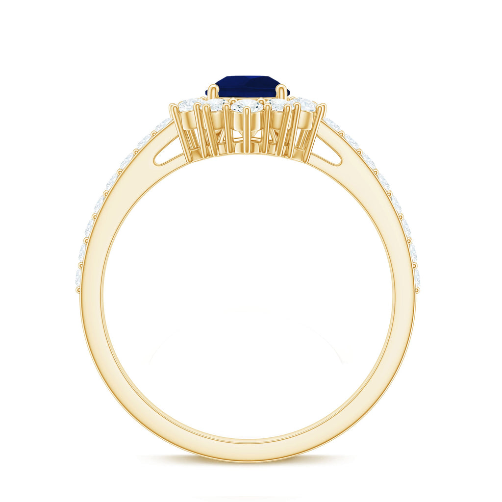 Blue Sapphire Teardrop Solitaire Ring with Diamond Accent