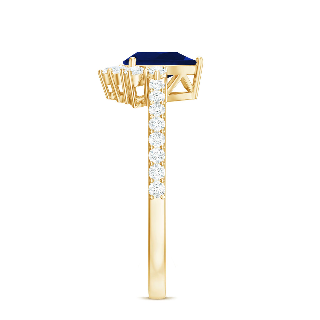 Blue Sapphire Teardrop Solitaire Ring with Diamond Accent