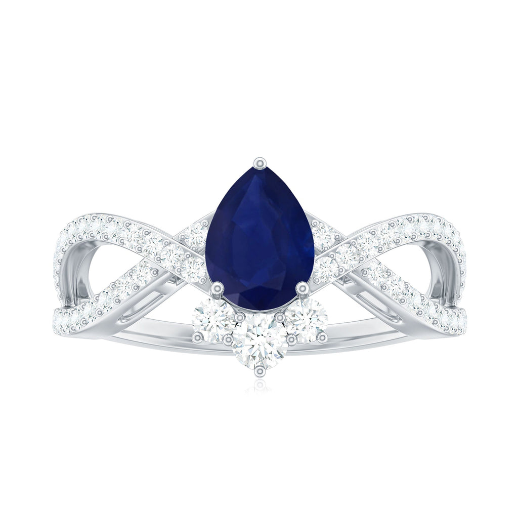 Pear Cut Blue Sapphire and Diamond Crossover Engagement Ring