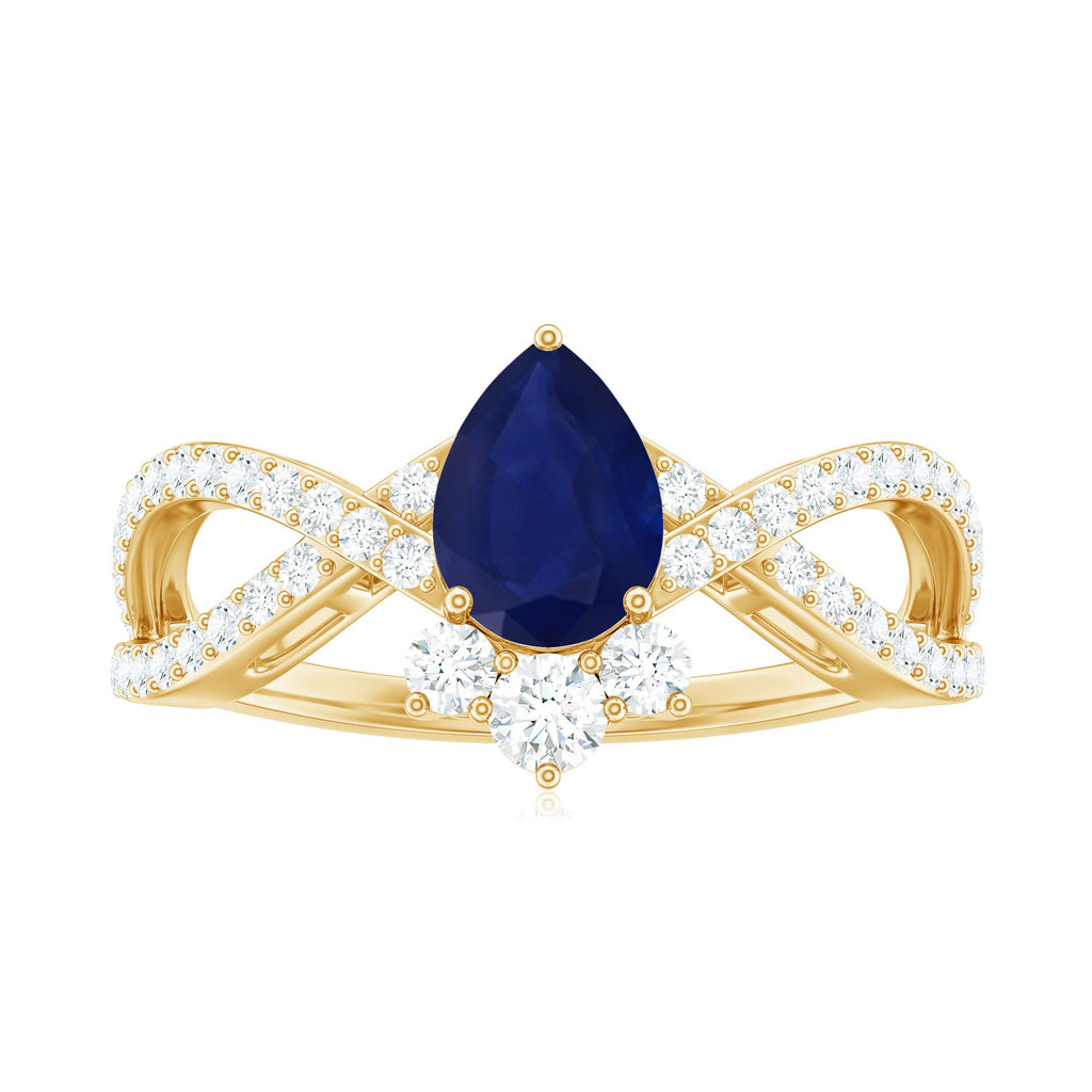 Pear Cut Blue Sapphire and Diamond Crossover Engagement Ring