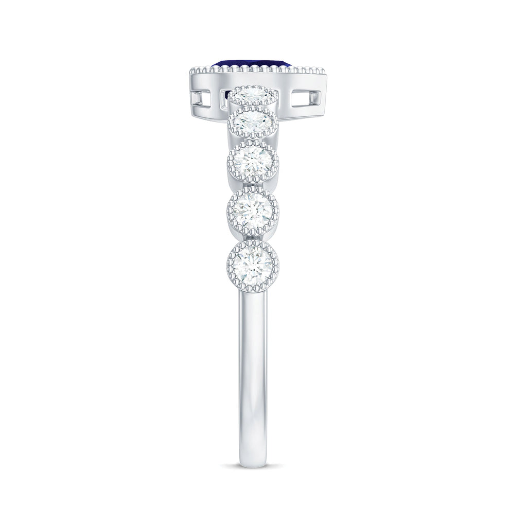 Pear Cut Blue Sapphire Solitaire Ring with Diamond Accent