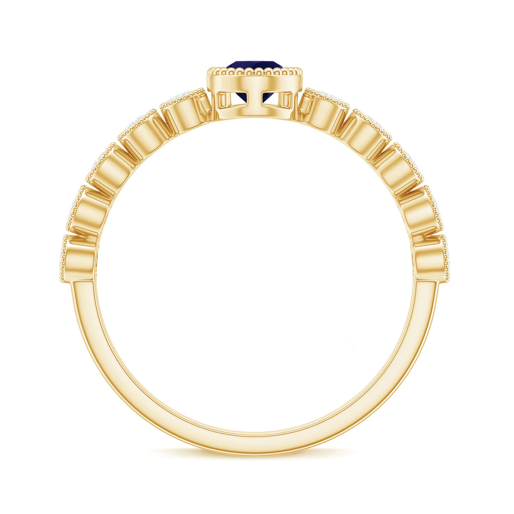 Pear Cut Blue Sapphire Solitaire Ring with Diamond Accent
