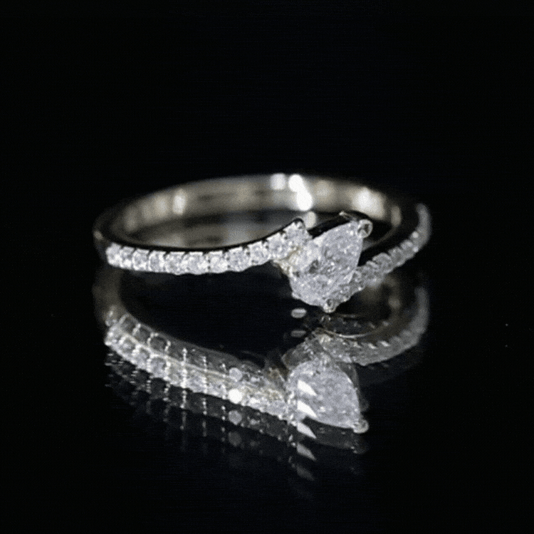 Tilted Pear Shape Simulated Diamond Bypass Promise Ring in Gold