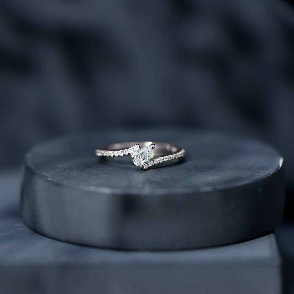 Tilted Pear Shape Simulated Diamond Bypass Promise Ring in Gold