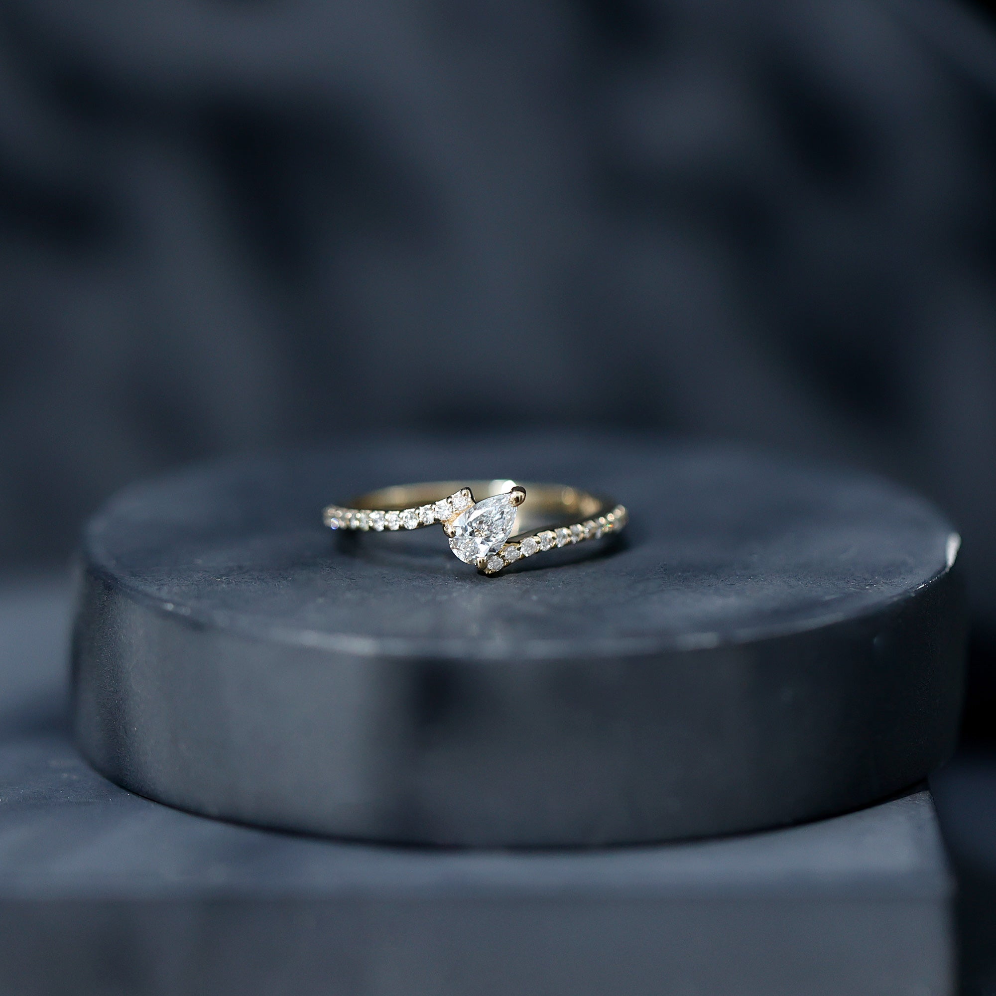 Tilted Pear Shape Simulated Diamond Bypass Promise Ring in Gold