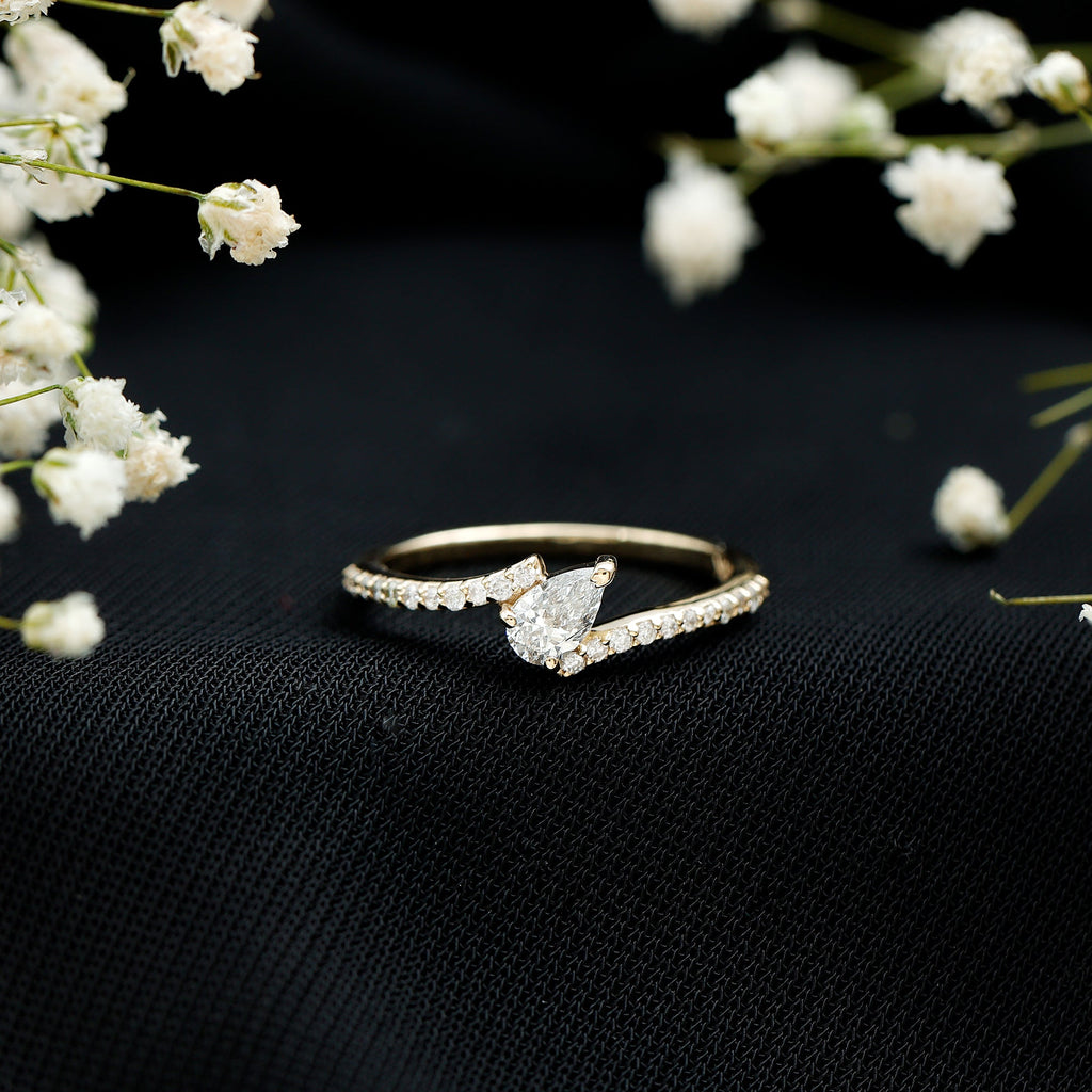 Tilted Pear Shape Simulated Diamond Bypass Promise Ring in Gold