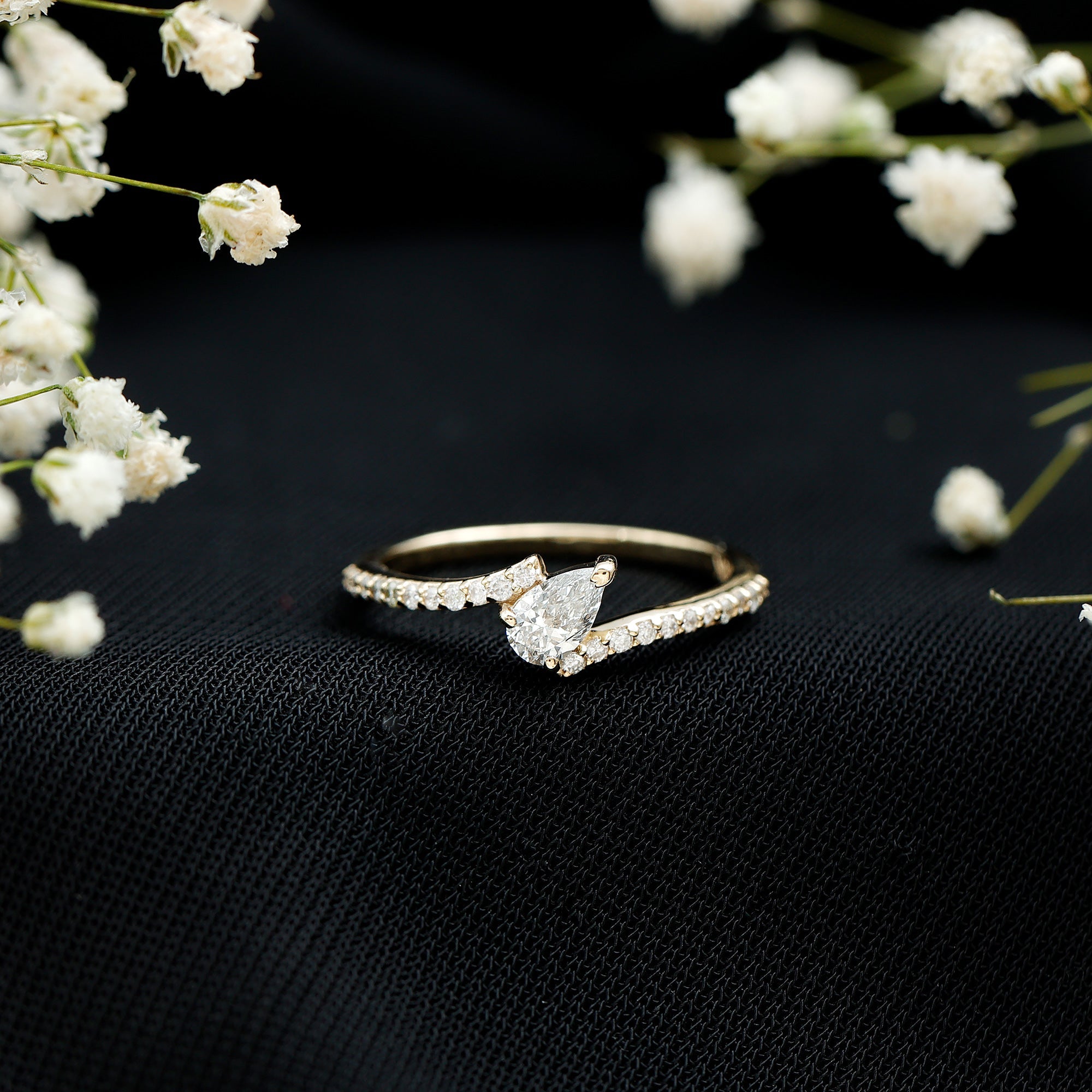 Tilted Pear Shape Simulated Diamond Bypass Promise Ring in Gold