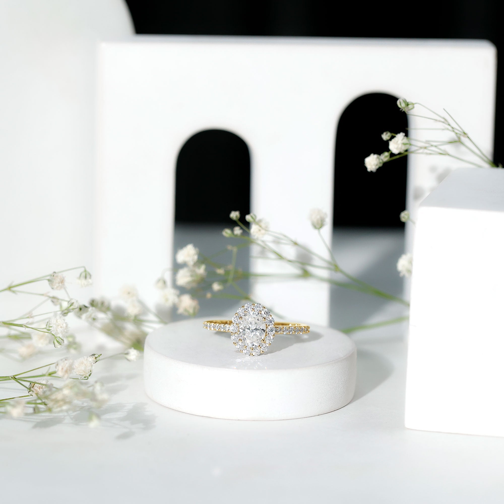 3 CT Oval Simulated Diamond Classic Halo Ring in Gold