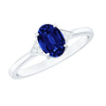 Oval Created Blue Sapphire Solitaire Ring with Diamond Accent