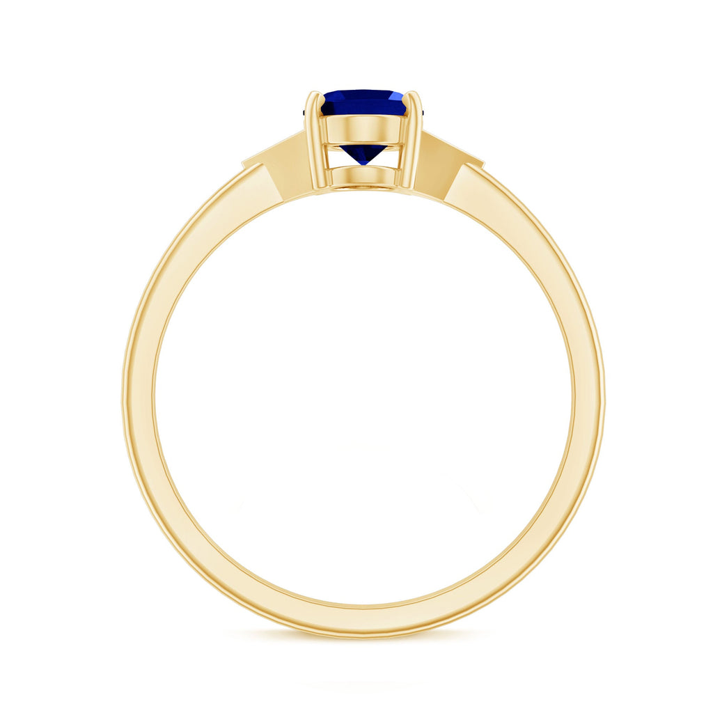 Oval Created Blue Sapphire Solitaire Ring with Diamond Accent