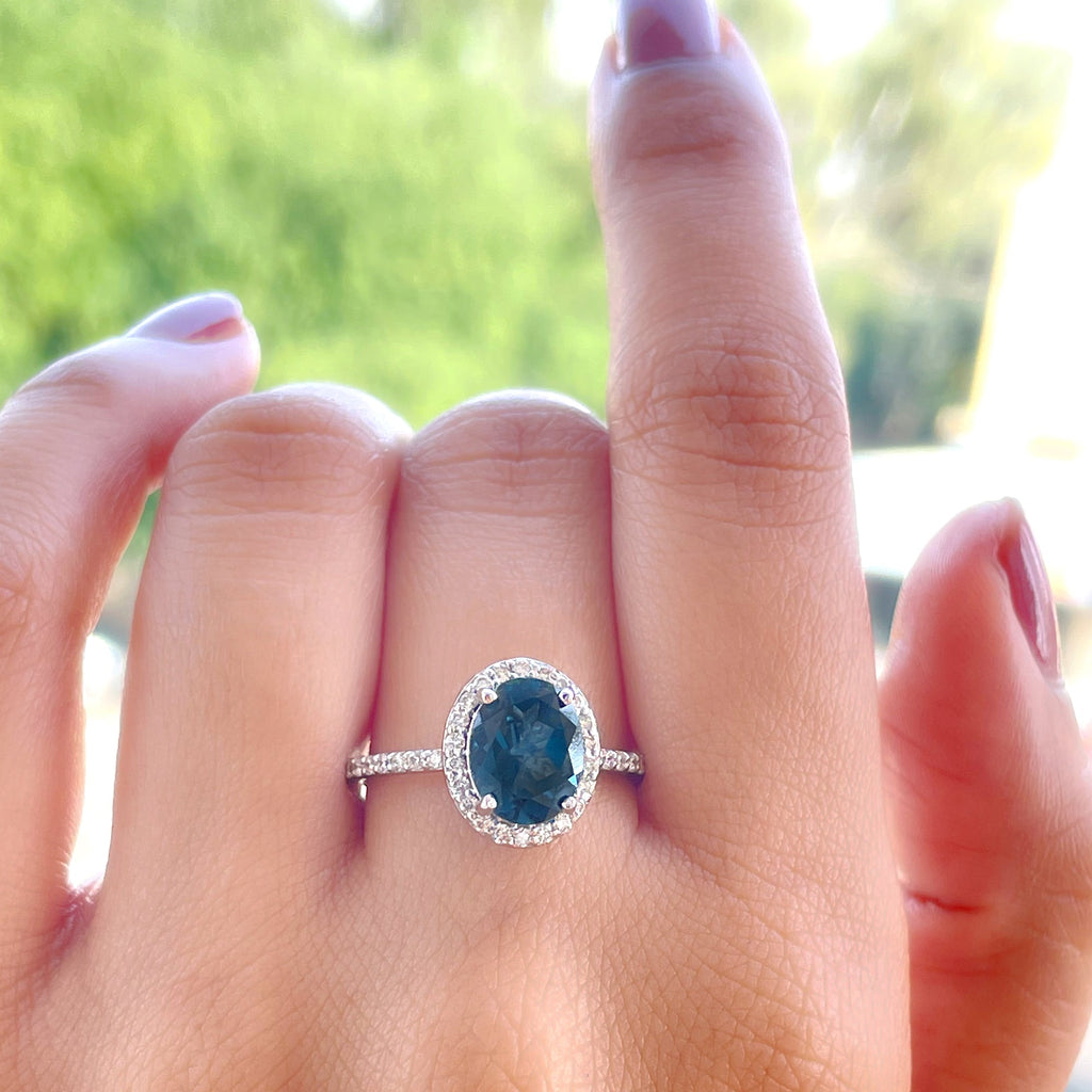 Classic London Blue Topaz Oval Engagement Ring with Diamond Halo