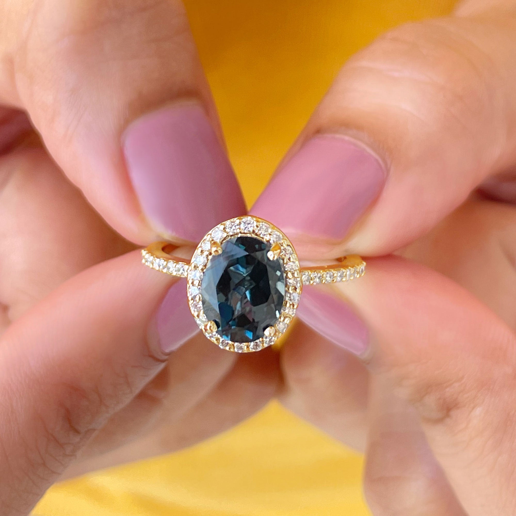 Classic London Blue Topaz Oval Engagement Ring with Diamond Halo