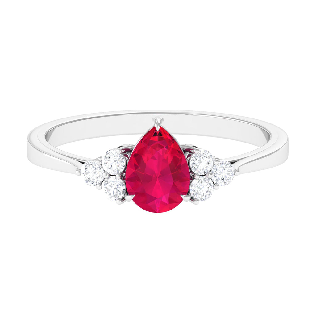 Claw Set Ruby Pear Solitaire Ring with Diamond Trio