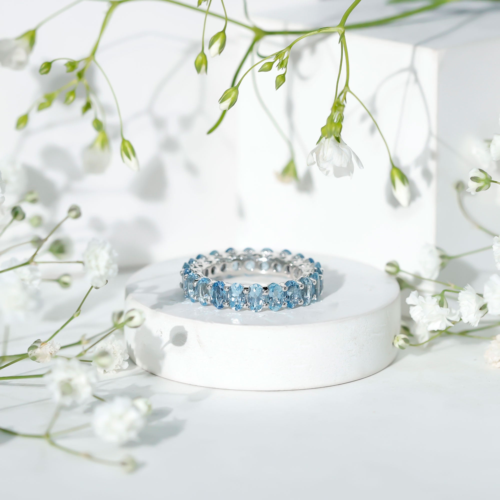 Oval Cut Aquamarine Eternity Wedding Band