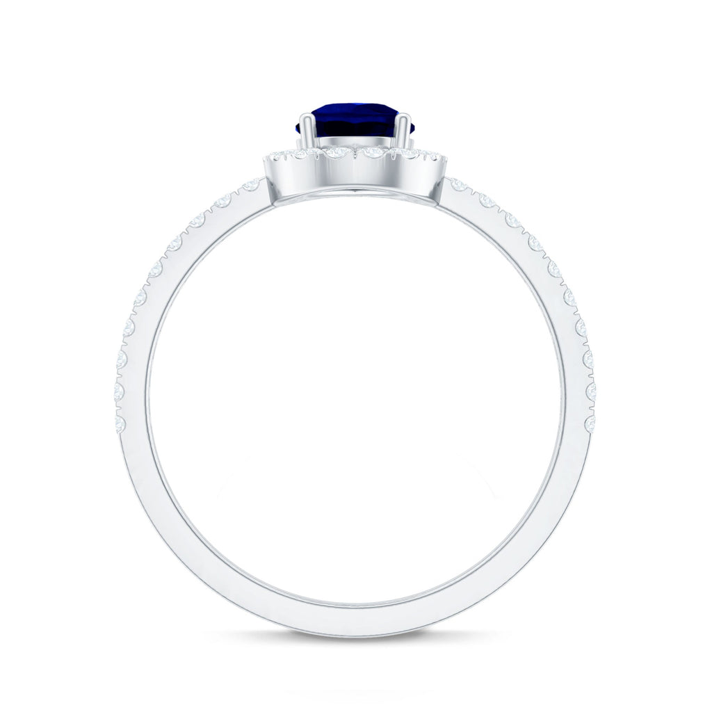 Created Blue Sapphire Teardrop Engagement Ring with Diamond Halo