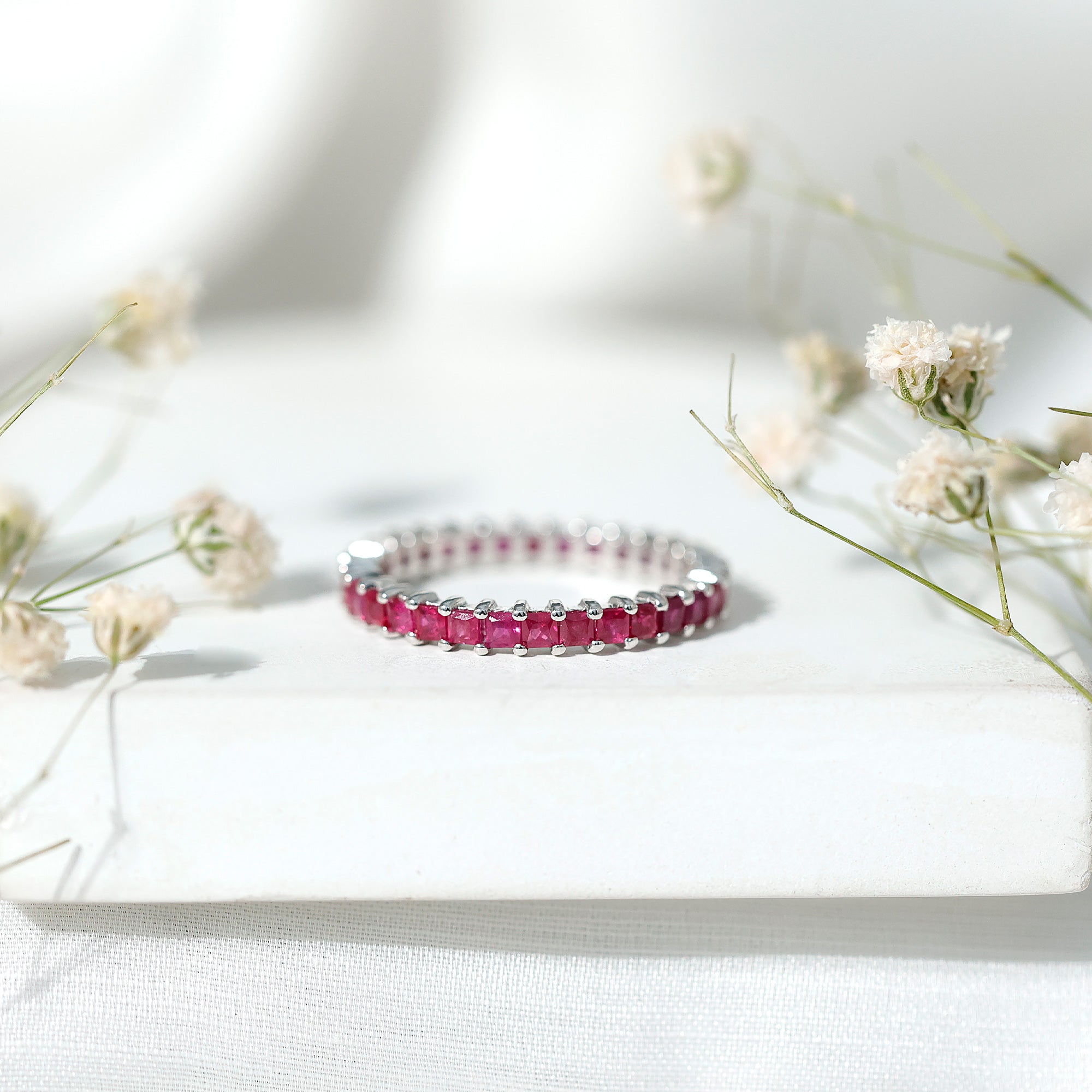 Princess Cut Ruby Eternity Ring in Shared Prong Setting