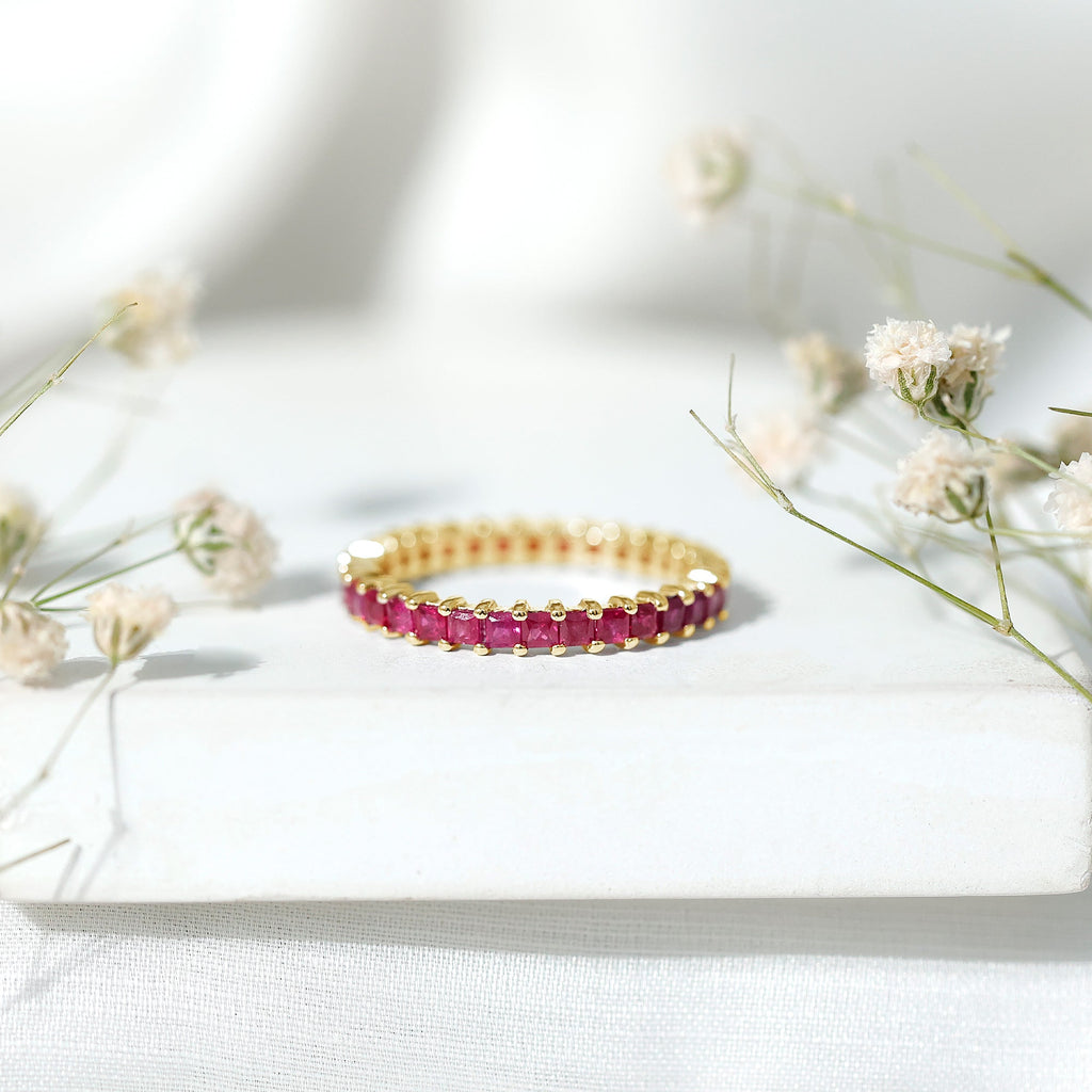 Princess Cut Ruby Eternity Ring in Shared Prong Setting