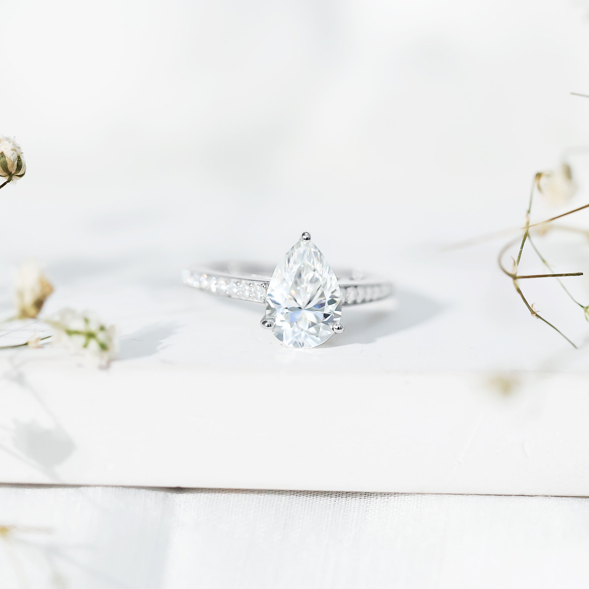 Classic Pear Cut Moissanite Solitaire Engagement Ring With Side Stones