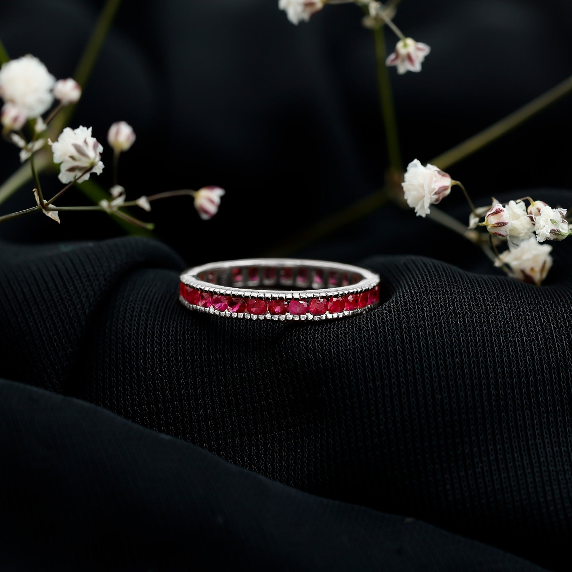 Channel Set Ruby Eternity Band Ring with Milgrain Detailing
