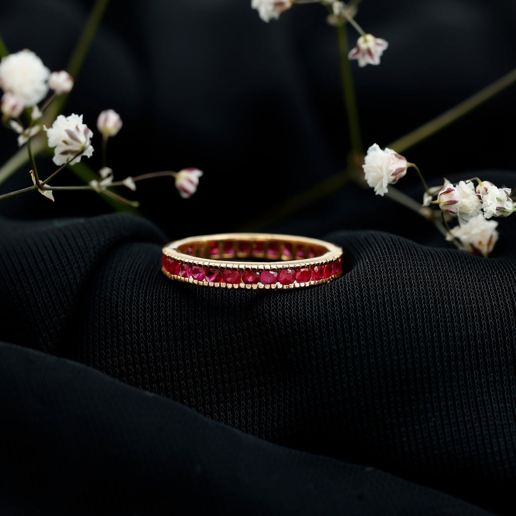 Channel Set Ruby Eternity Band Ring with Milgrain Detailing