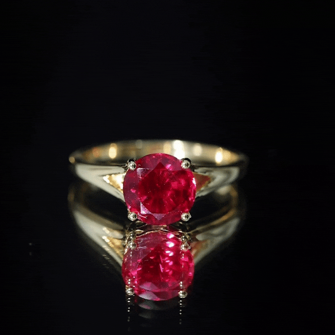 Split Shank Round Created Ruby Solitaire Ring with Surprise Diamond