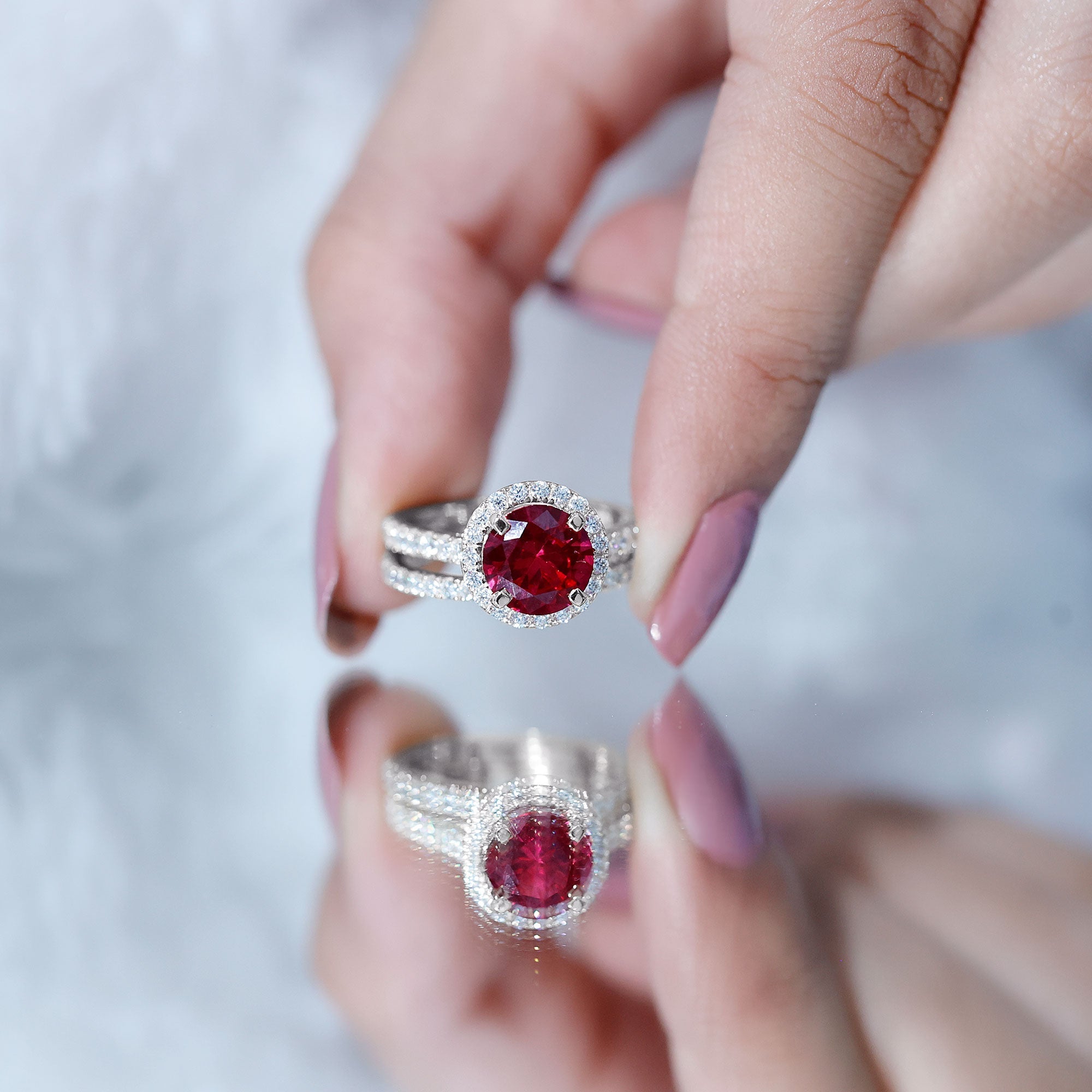 Split Shank Round Created Ruby Solitaire Ring with Surprise Diamond