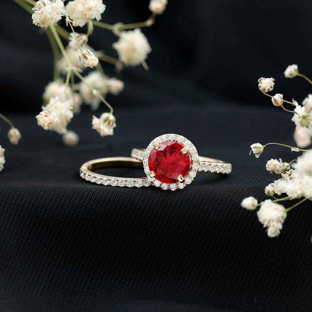 Split Shank Round Created Ruby Solitaire Ring with Surprise Diamond