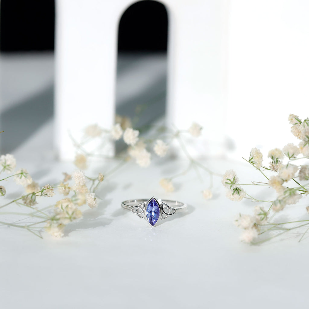 Natural Bezel Set Marquise Tanzanite Promise Ring with Celtic Knot