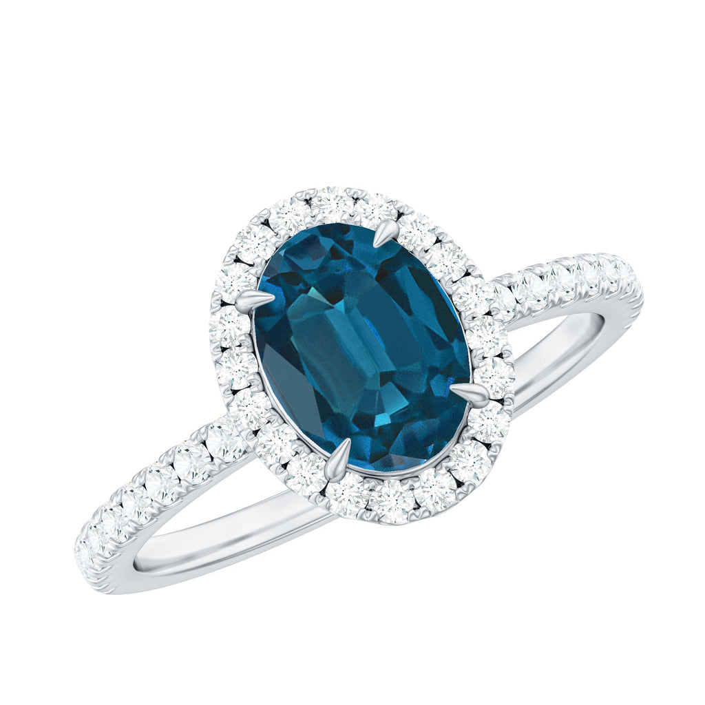 Oval 6X8MM London Blue Topaz Halo Engagement Ring