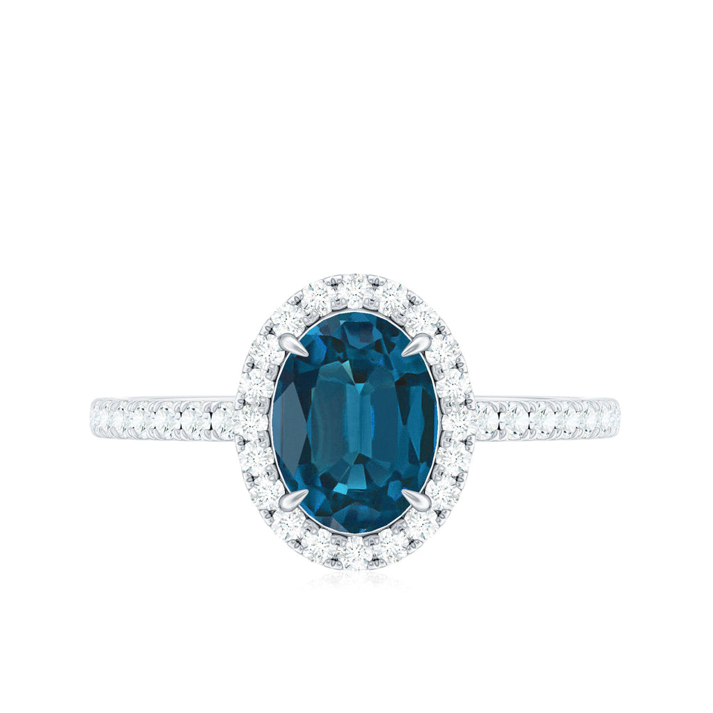 Oval 6X8MM London Blue Topaz Halo Engagement Ring
