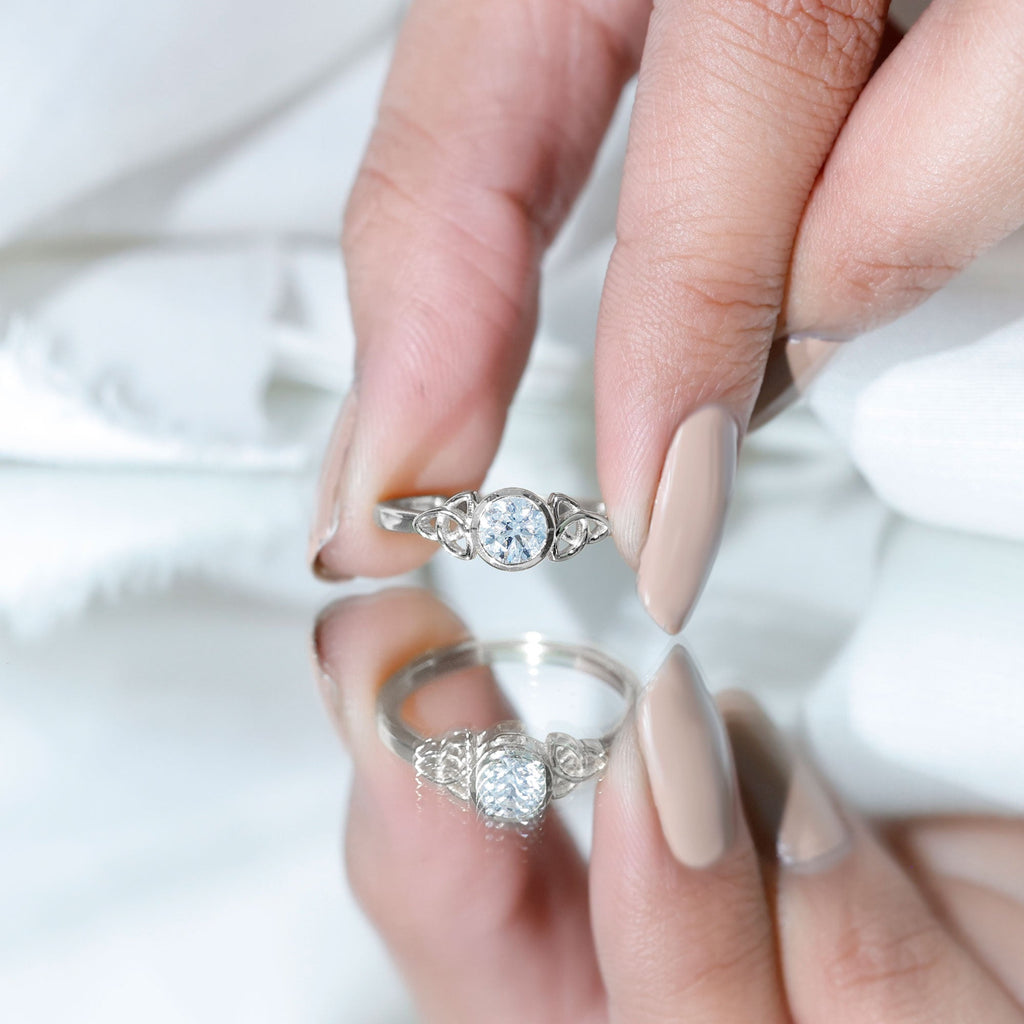 Bezel Set Moissanite Promise Ring with Celtic Knot Details