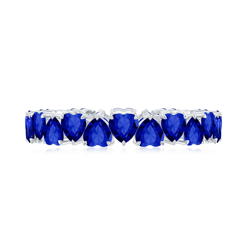 Claw Set Created Blue Sapphire Heart Eternity Band Ring in Gold