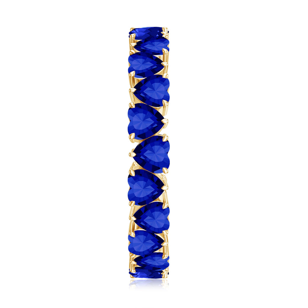Claw Set Created Blue Sapphire Heart Eternity Band Ring in Gold