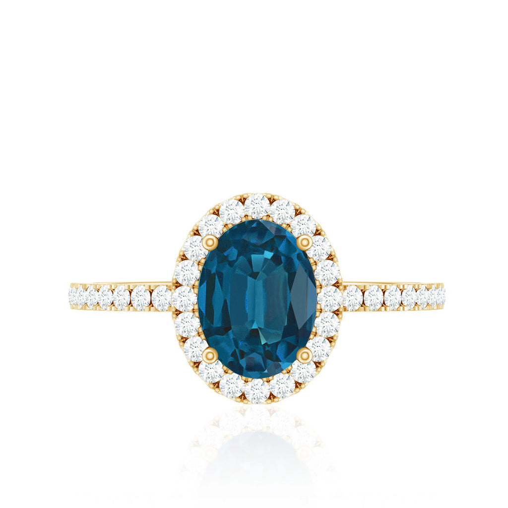 6X8mm Oval Cut London Blue Topaz Classic Engagement Ring with Diamond Halo