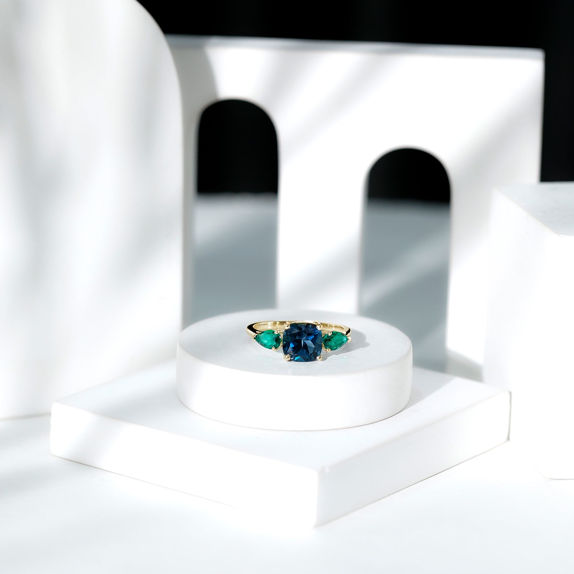 8mm Cushion Shape London Blue Topaz Three Stone Engagement Ring with Lab Emerald