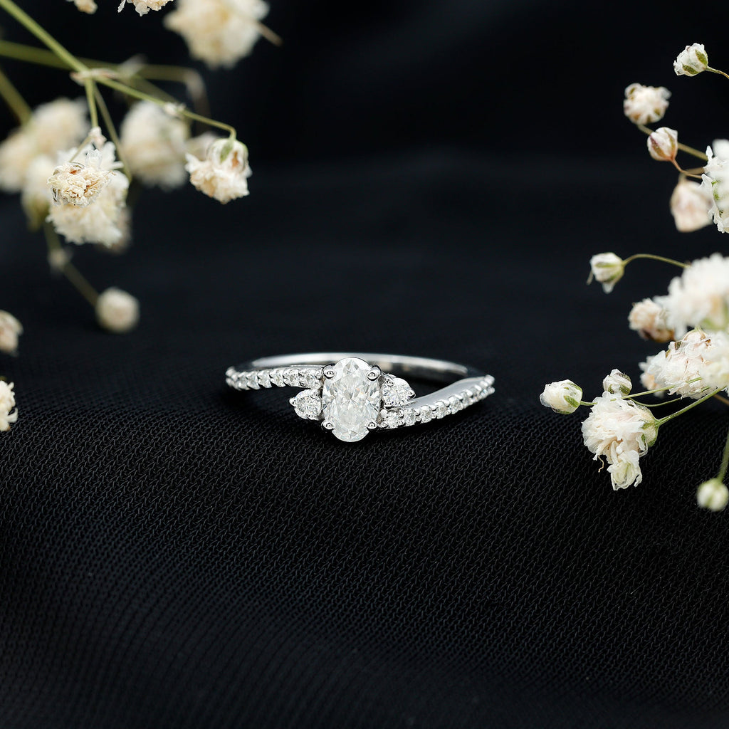 Oval Shape Moissanite Bypass Engagement Ring with Side Stones