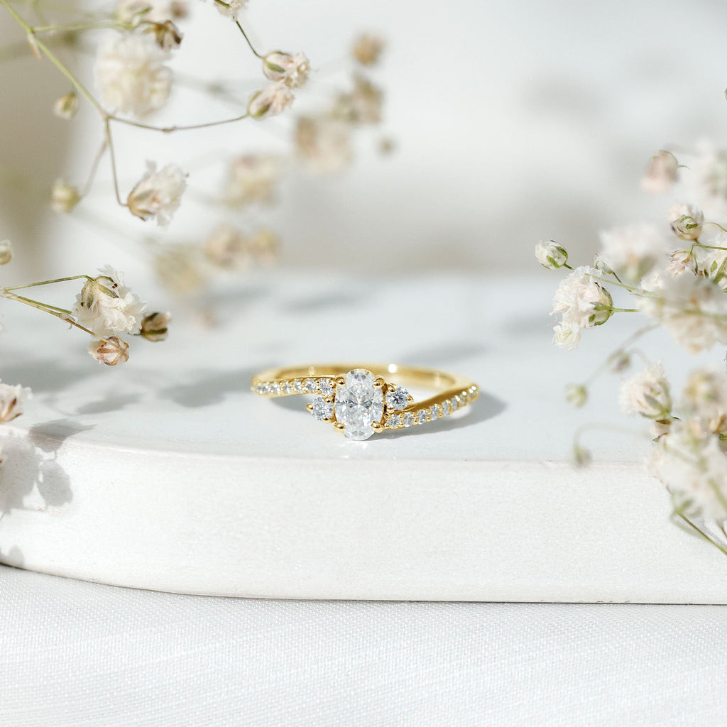 Oval Shape Moissanite Bypass Engagement Ring with Side Stones